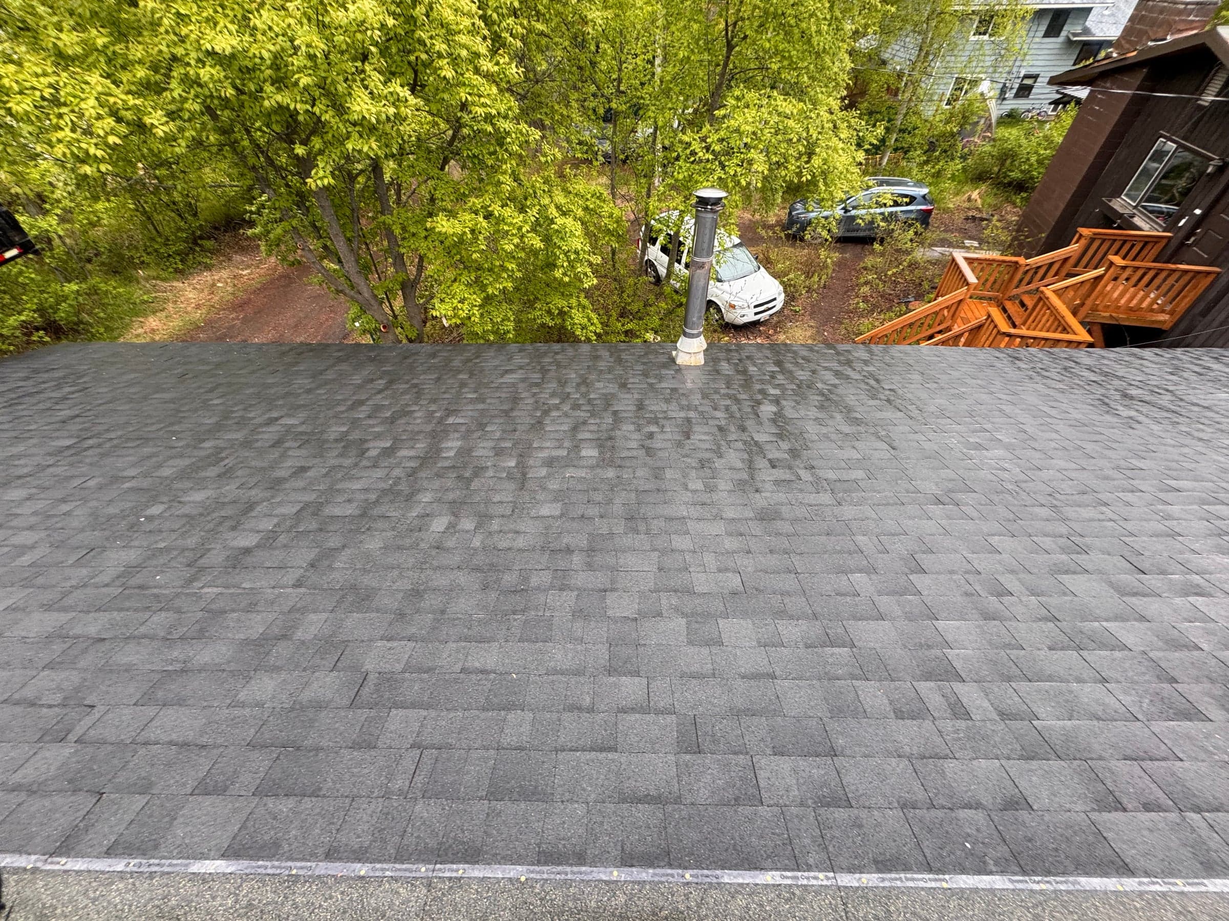 Eave detail of a freshly installed roof — written proposal, no pressure