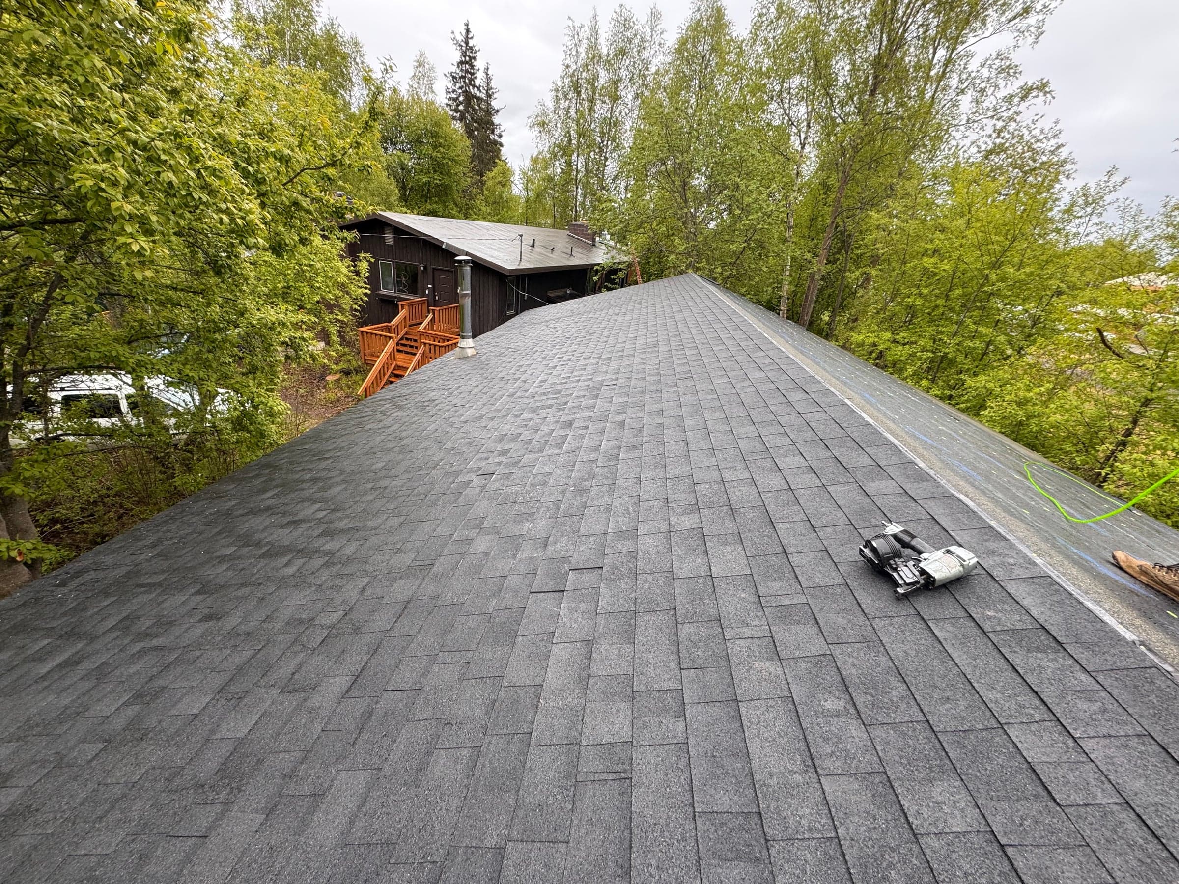 Finished architectural shingle roof in an Anchorage neighborhood